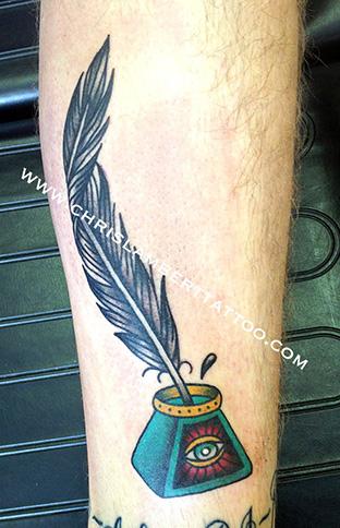 Quill pen and ink pot tattoo