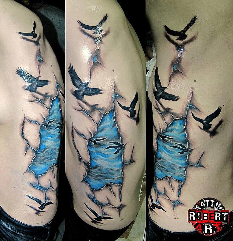 birds flying from clouds angles robert tattoo art