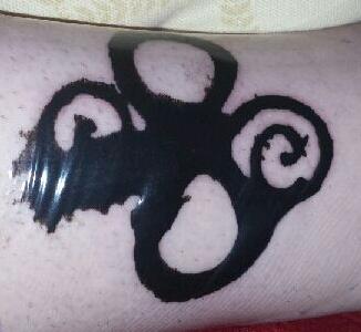 Plasma buildup under Tegaderm 65 hours - Celtic Tribal and Tiki Tattoos - Last Sparrow Tattoo