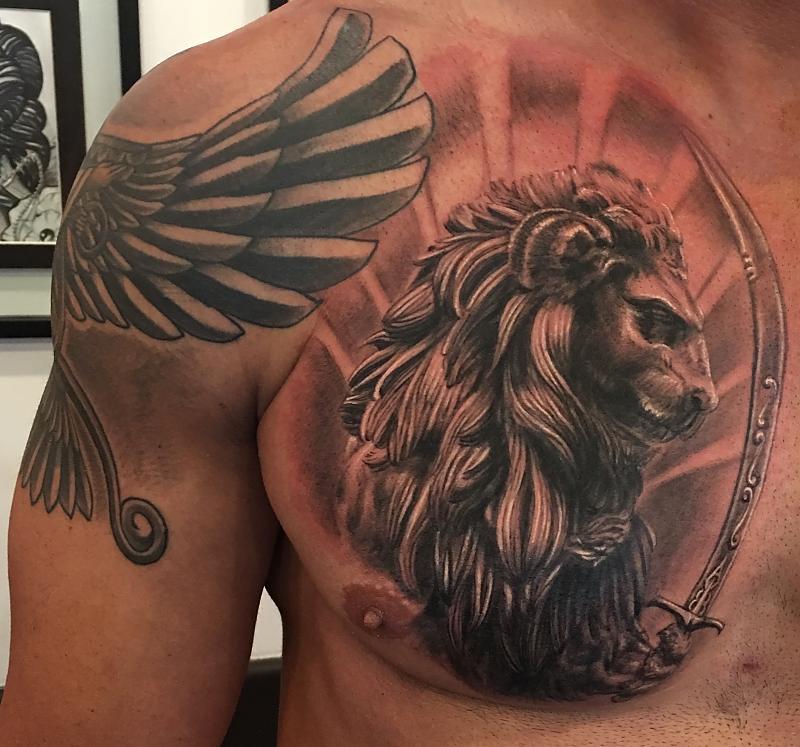 Persian lion sword chest piece - Animal Tattoos - Last Sparrow Tattoo