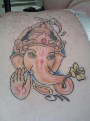 Ganesh with yellow hibiscus