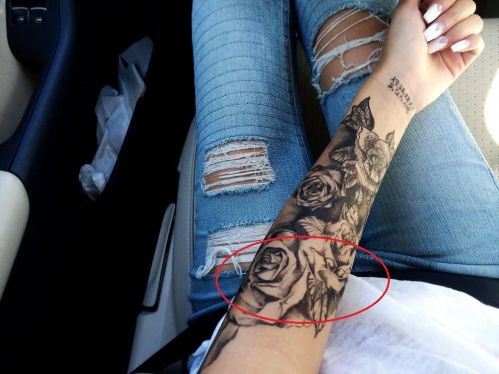 Black-Ink-Roses-Tattoo-On-Girl-Left-Forearm.jpg