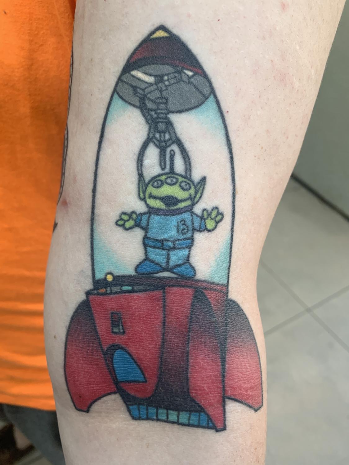 Toy Story Alien tattoo.